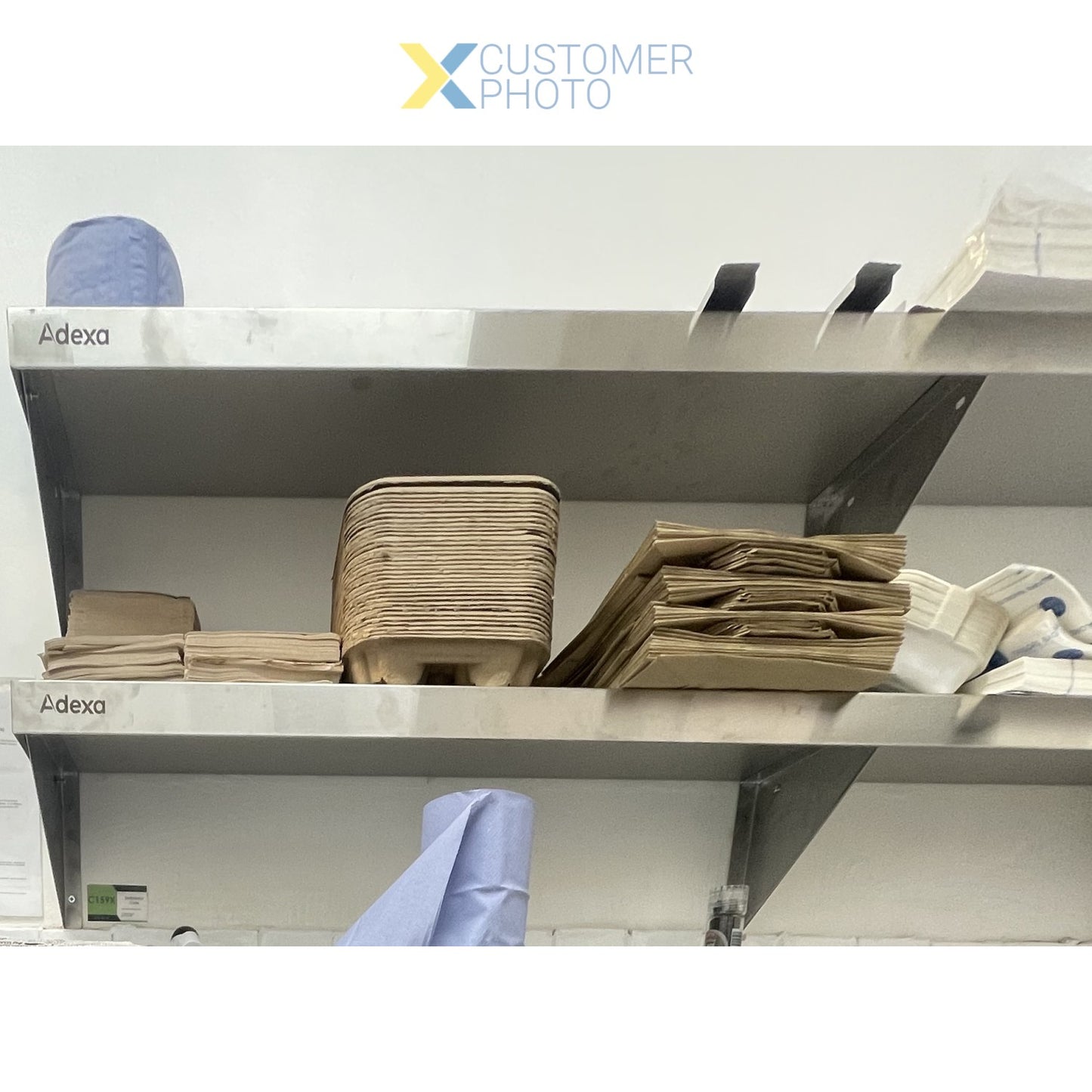 WHWS126018 Wall Shelf — customer photo showing shelf loaded with pots and pans